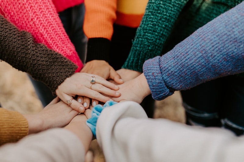 Hands together in support